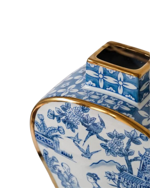 Blauw-witte porseleinen vaas met gouden accenten